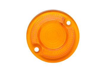The yellow turn signal of the retro car is isolated on a white background. Round turn lamp close-up.