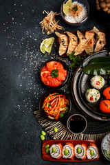 Traditional Japanese food dishes served on the table.
