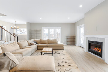 Minimalist living room interiors in neutral tones and natural lighting.