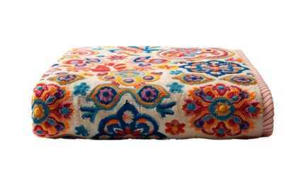 Beautifully folded colorful embroidered fabric, showcasing intricate floral and geometric patterns, ideal for home decor and crafts.