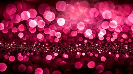  A tight shot of a pink-black dual tone background, adorned with circular lights at its center, and a horizontal row of lights positioned midway