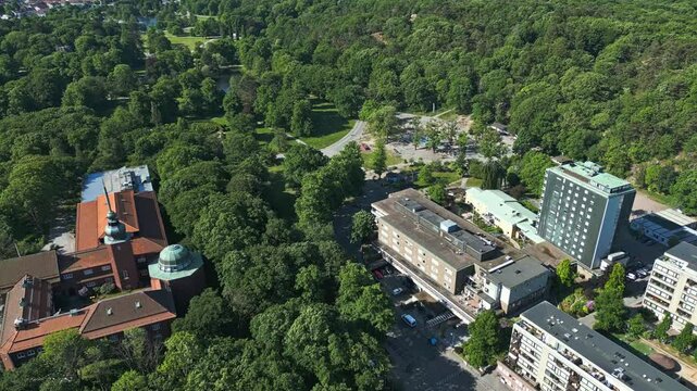 Flying over Plikta playground in Slottsskogen city park and to the bottom left is the Gothenburg Museum of Natural History in Gothenburg, Sweden