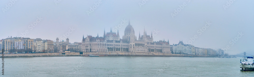 Poster Panorama of Pest side with Parliament building in morning fog, Budapest, Hungary