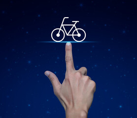 Hand pressing bicycle flat icon over fantasy night sky and moon, Business bicycle service concept