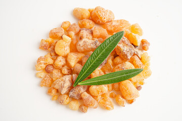 Frankincense or olibanum aromatic resin isolated on white background used in incense and perfumes.