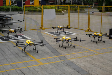 SHENZHEN, CHINA - APRIL 24, 2024: Delivery of goods by drone or multicopter using the Meituan app. The future of order delivery in Shenzhen City © Andrey