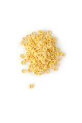 Isolated anelletti pasta. The small, ring-shaped macaroni is dis