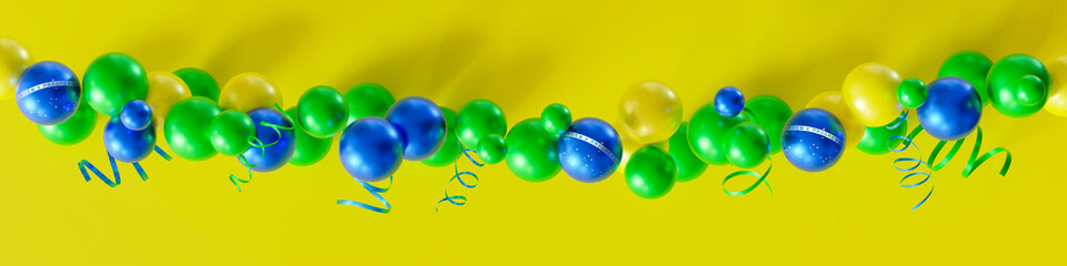 Festive garland of balloons, featuring Brazil's national colors of green, yellow, and blue, adorned with the motto Ordem e Progresso. Brazilian Independence Day. National holiday in Brazil. 3D render.