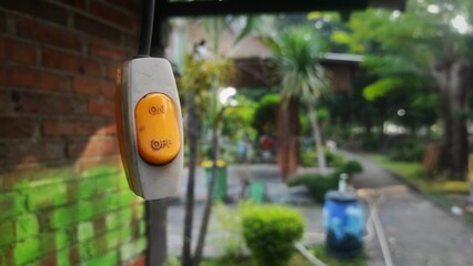 On and off plastic switch to turn on and turn off the light in the hut of the park