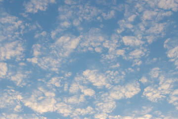 The sky is blue with many clouds