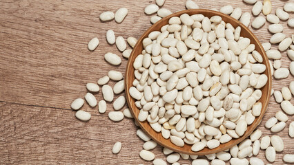top view flat lay raw white bean in wood bowl on table food background copy space