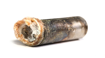 Unbranded corroded alkaline battery leaking potassium hydroxide
