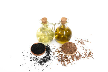 Olej z czarnuszki i nasion lnu, złocisty z pierwszego tłoczenia  © Paweł Kacperek