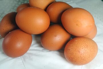 Fresh raw chicken eggs are placed in rows. Cover with tissue and water. in cardboard containers. Chicken eggs are healthy for the body. high nutritional value