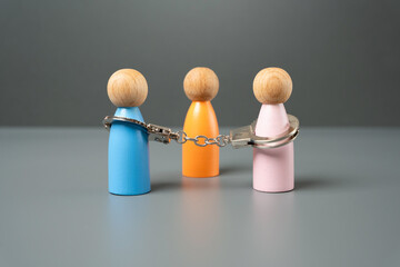The couple are handcuffed by obligations. Marriage concept. Establish the obligations of the...