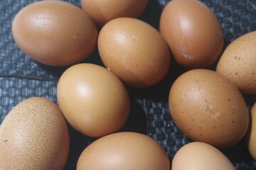 Fresh raw chicken eggs are placed in rows. Cover with tissue and water. in cardboard containers. Chicken eggs are healthy for the body. high nutritional value