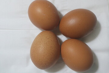 Fresh raw chicken eggs are placed in rows. Cover with tissue and water. in cardboard containers. Chicken eggs are healthy for the body. high nutritional value