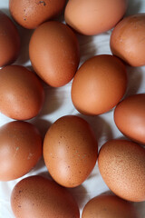 Fresh raw chicken eggs are placed in rows. Cover with tissue and water. in cardboard containers. Chicken eggs are healthy for the body. high nutritional value