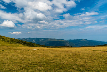 Tarcu mountains from meadow bellow Zlata hill above Zanoaga lake in Retezat mountains in Romania