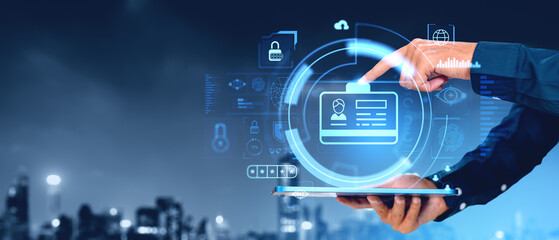 Man hands and finger touch tablet, digital ID with icons hologram. Copy space