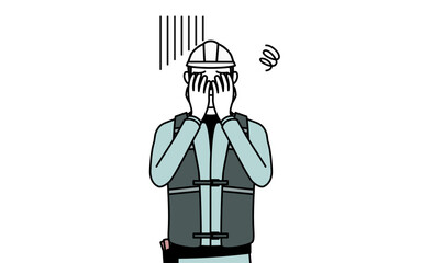 落ち込んで顔を覆うヘルメットと作業着姿のシニア男性技師