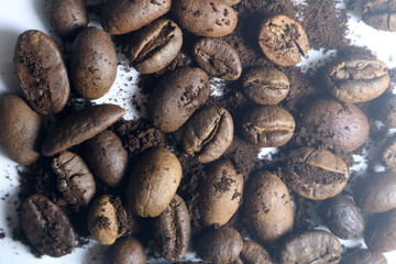coffee beans. powder. cream. on a white background. the aroma of Sumatran coffee. arabica coffee. civet coffee. expensive and luxurious. drink lover