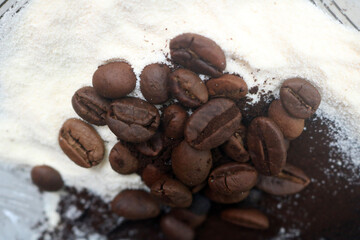 coffee beans. powder. cream. on a white background. the aroma of Sumatran coffee. arabica coffee. civet coffee. expensive and luxurious. drink lover