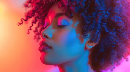 Fototapeta premium Curly-haired woman is in a room with bright, colorful lighting, giving the image a lively and energetic feel