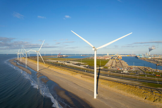 Netherlands,South Holland,Rotterdam, Newly constructed wind farm along North Sea beach
