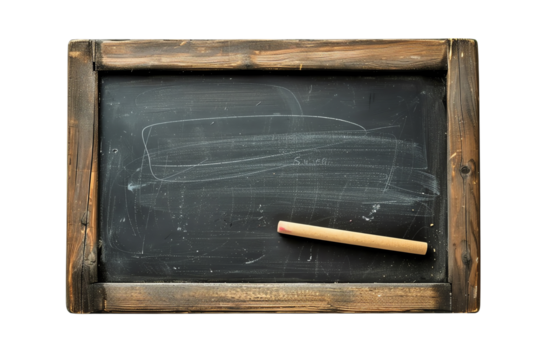 Vintage chalkboard with wooden frame and chalk stick on black surface. Empty blackboard for writing and drawing.