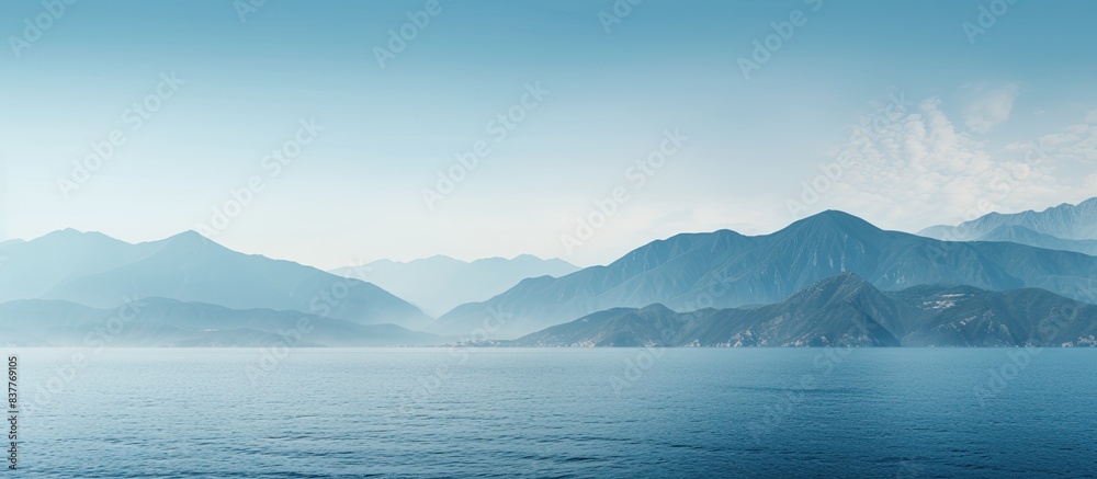 Poster Scenic view of mountains and ocean with copy space image.