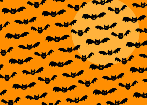 Halloween pattern of black bats flying against orange moon