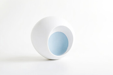 White ceramic sphere with a blue interior