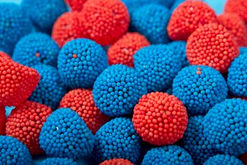 Close-up of red and blue berry flavored soft jelly candy