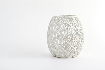 White wicker basket on white background