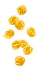 Falling pasta, tagliatelle, fettuccine isolated on white background, full depth of field