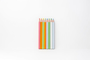 Obraz premium Colored Pencils on White Background