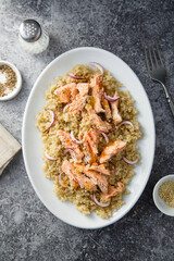 Hot smoked salmon with quinoa and red onion