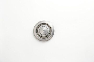 Close-up of a circular vent on a white ceiling