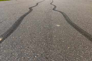 tire tracks during dangerous driving on the road