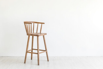 Wooden Bar Stool in Front of White Wall
