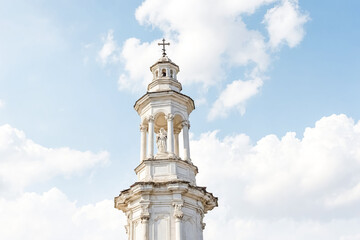 Obraz premium Church Bell Tower with Cloudy Sky