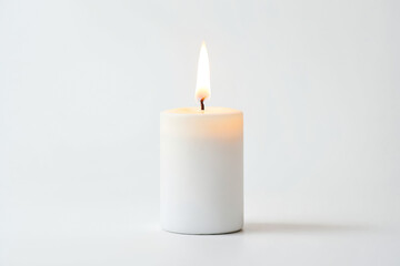 Single White Candle Burning on White Background