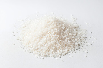 Pile of White Rice Grains on White Background