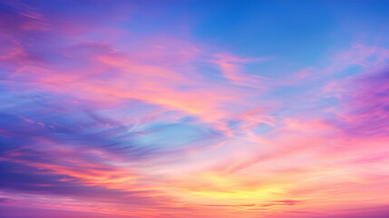 Fototapeta premium Beautiful sky background in colorful pastel colors at sunset or sunrise. Soft and gentle natural scenery.