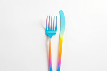 Colorful Fork and Knife on White Background