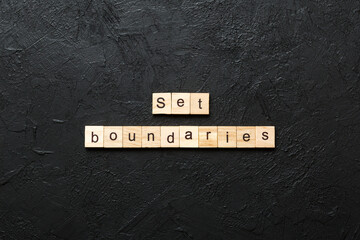 set boundaries word written on wood block. set boundaries text on table, concept