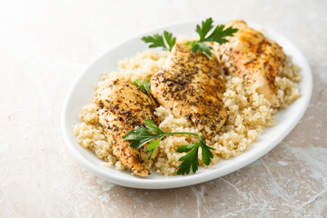 Baked chicken fillet with quinoa and herbs