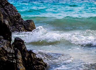 waves crashing on rocks