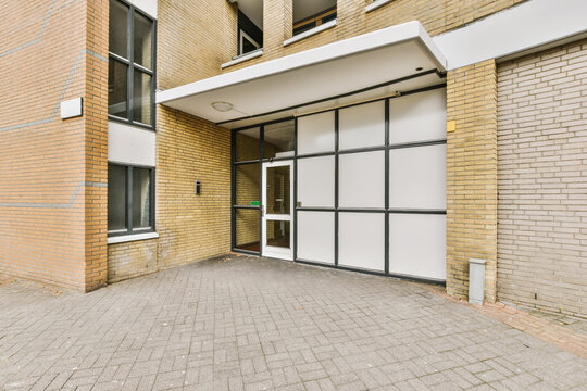 Modern apartment building entrance with geometric design